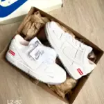 Zapatilla Unisex Nike Supreme Blanco y Gris